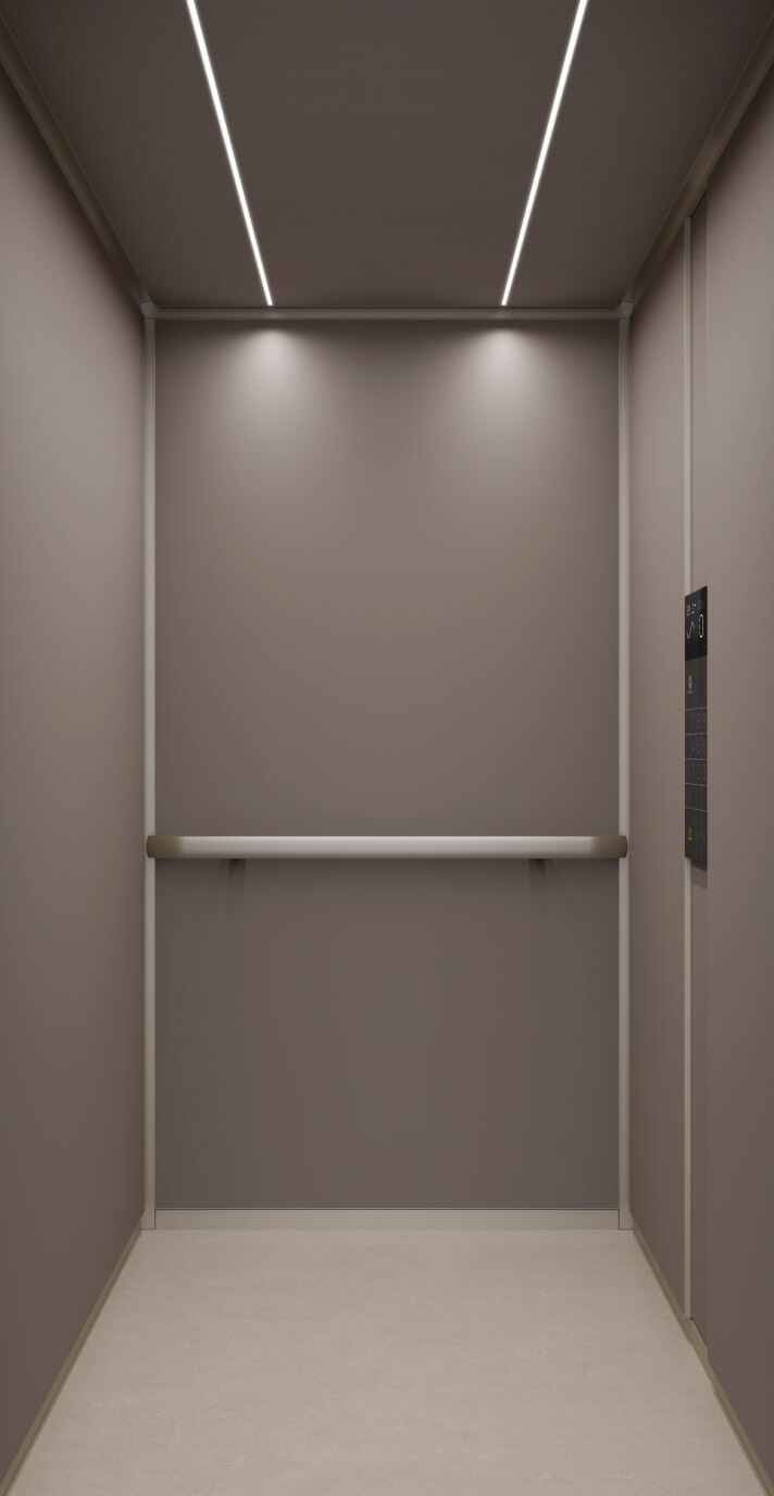 Gros plan sur un plafonnier dans un ascenseur Schindler X8 avec des panneaux sombres